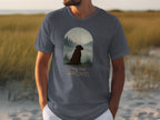 T-shirt graphic of a brown dog and text: "Paws And Reflect"