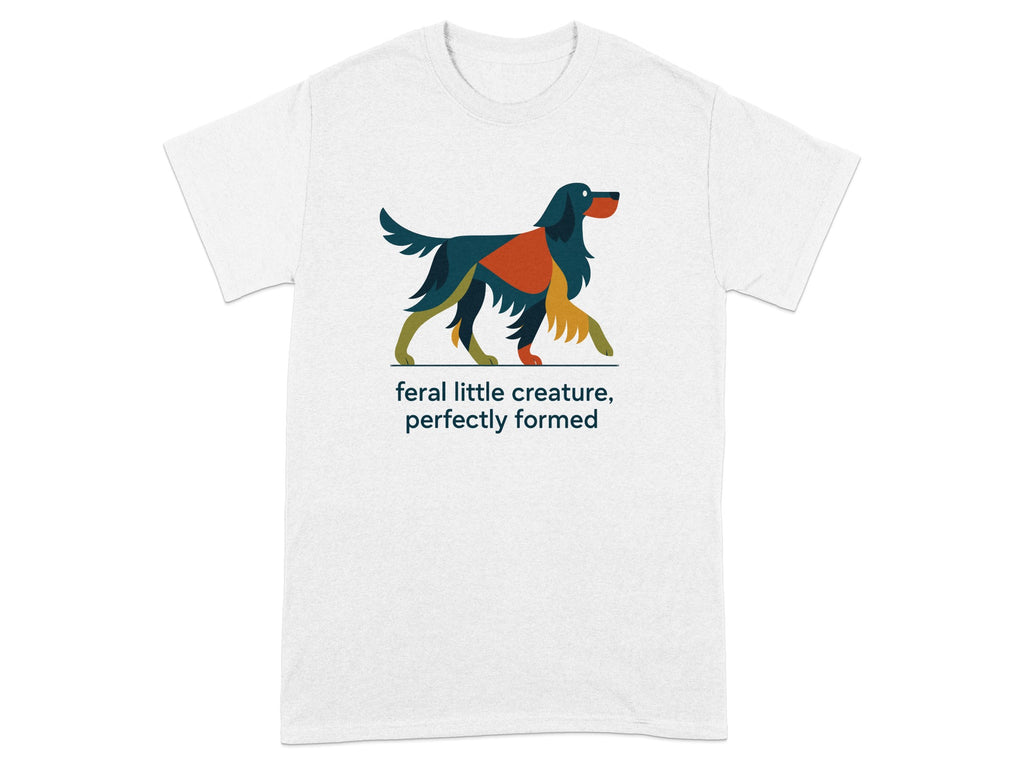 White t-shirt with abstract dog illustration and text "feral little creature, perfectly formed."
