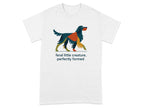 White t-shirt with abstract dog illustration and text "feral little creature, perfectly formed."