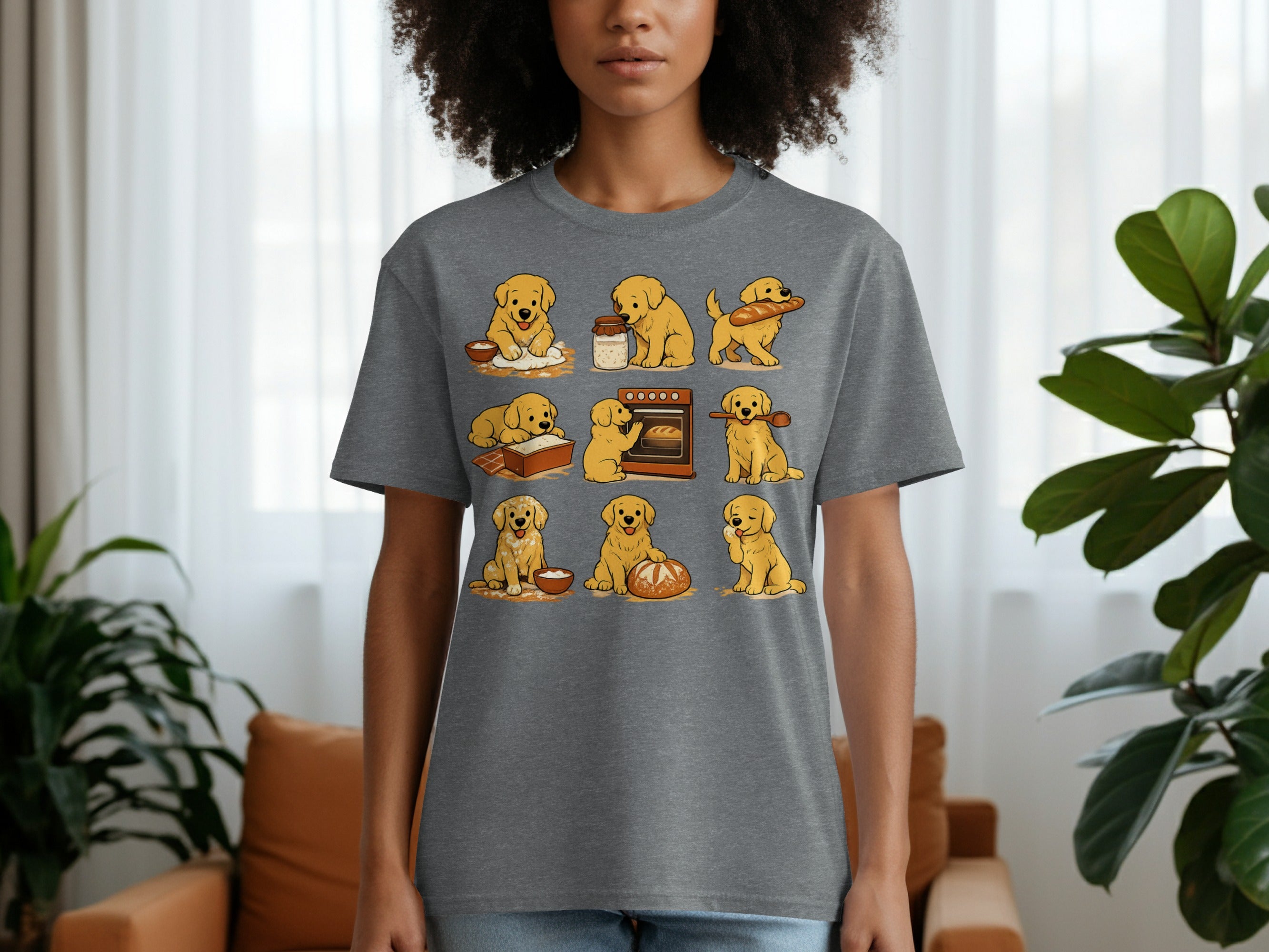 A grey t-shirt with a collage of nine cartoon golden retriever puppies baking bread.