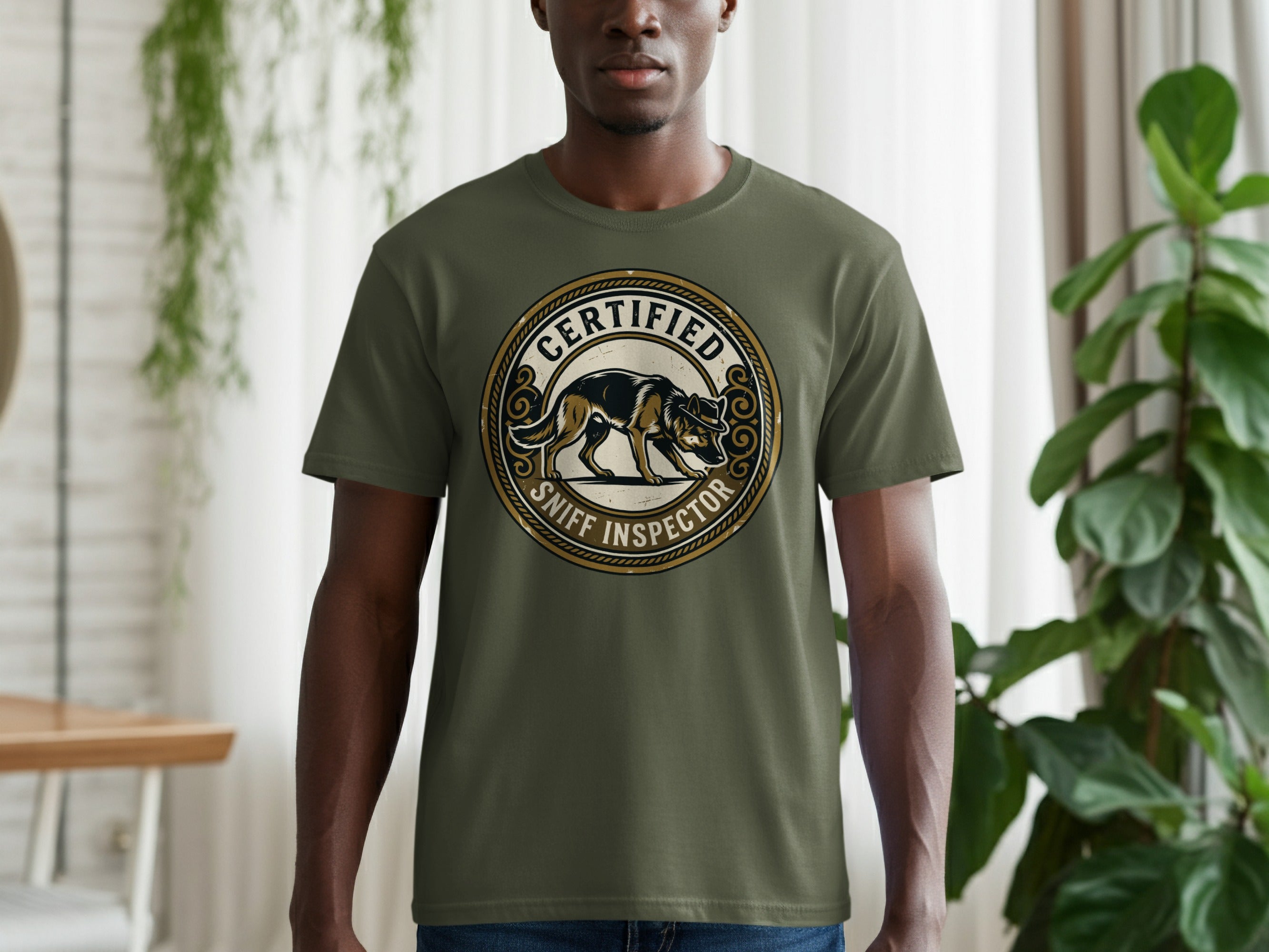 Green t-shirt with a "Certified Sniff Inspector" circular logo featuring a dog.