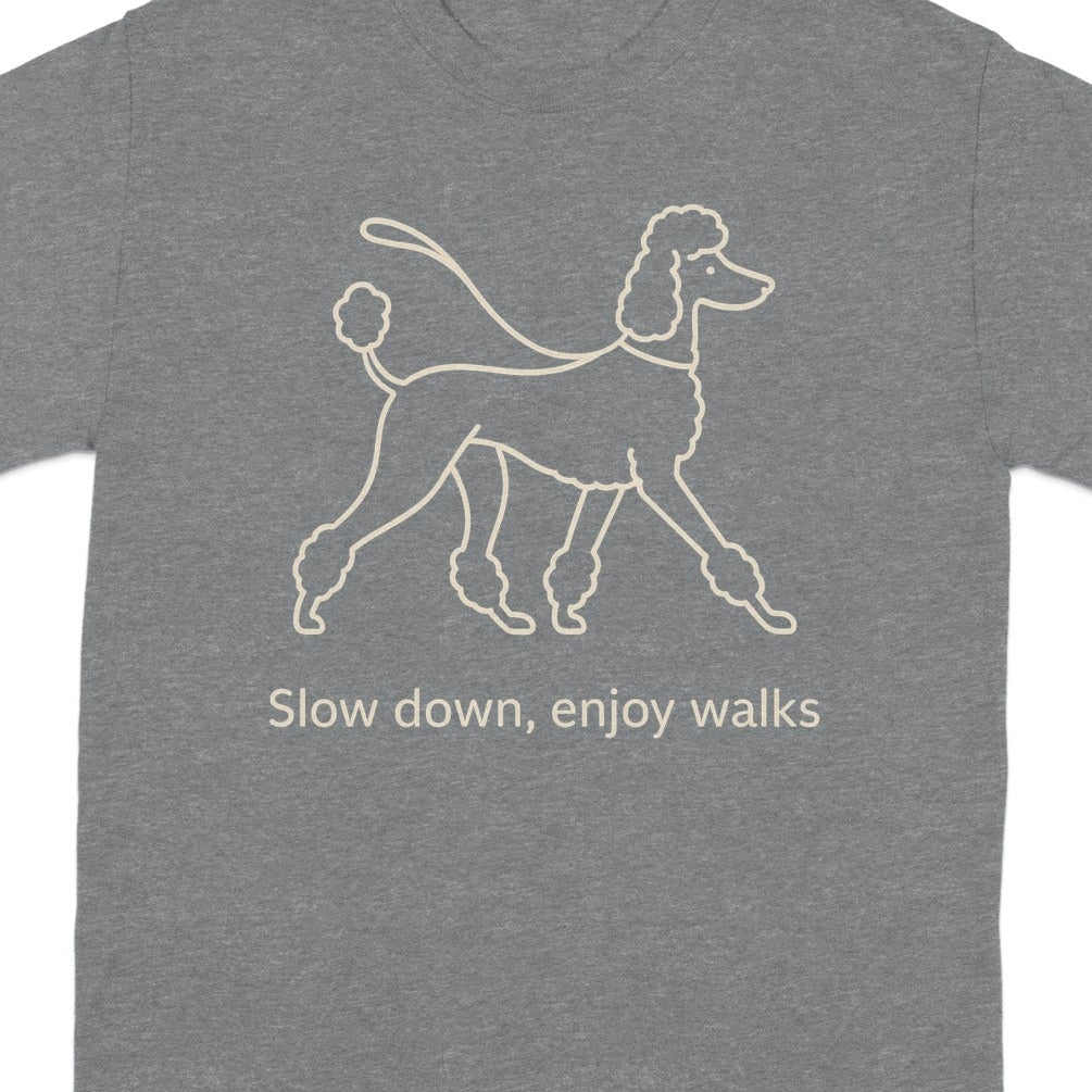 Grey t-shirt with a line drawing of a poodle and text that reads "Slow down, enjoy walks".