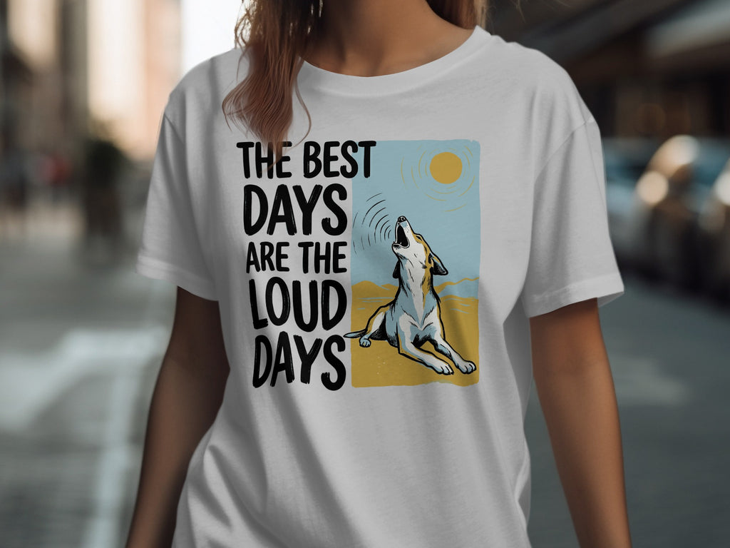 White t-shirt with "The best days are the loud days" text and howling wolf graphic.