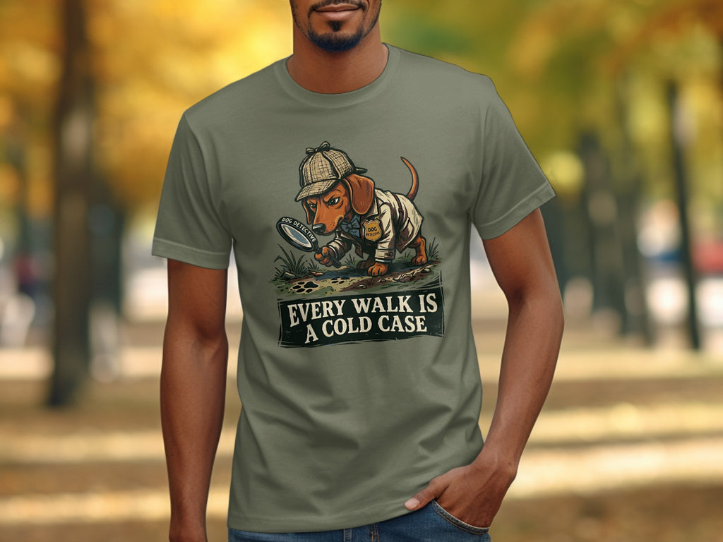 Dachshund detective with magnifying glass on t-shirt, "Every Walk is a Cold Case."