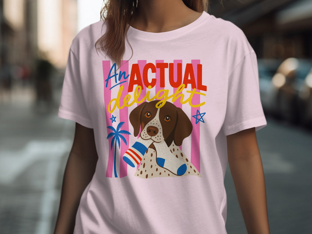 T-shirt with a dog wearing socks and the text "AN ACTUAL DELIGHT".