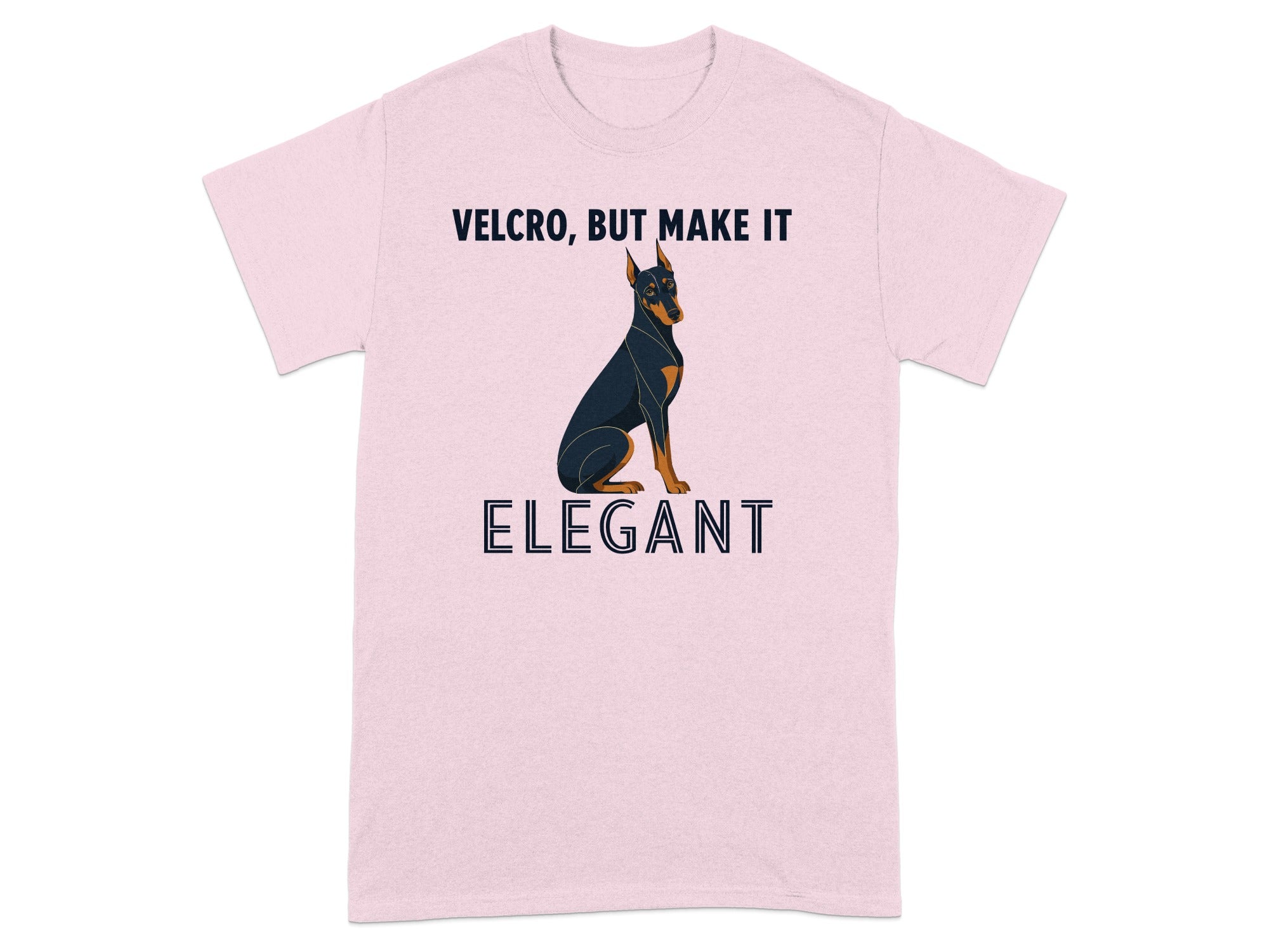 Pink t-shirt with a Doberman dog and the text "VELCRO, BUT MAKE IT ELEGANT".