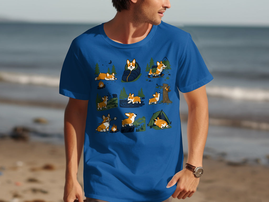 Blue t-shirt with a repeating cartoon pattern of corgis camping and enjoying the outdoors.