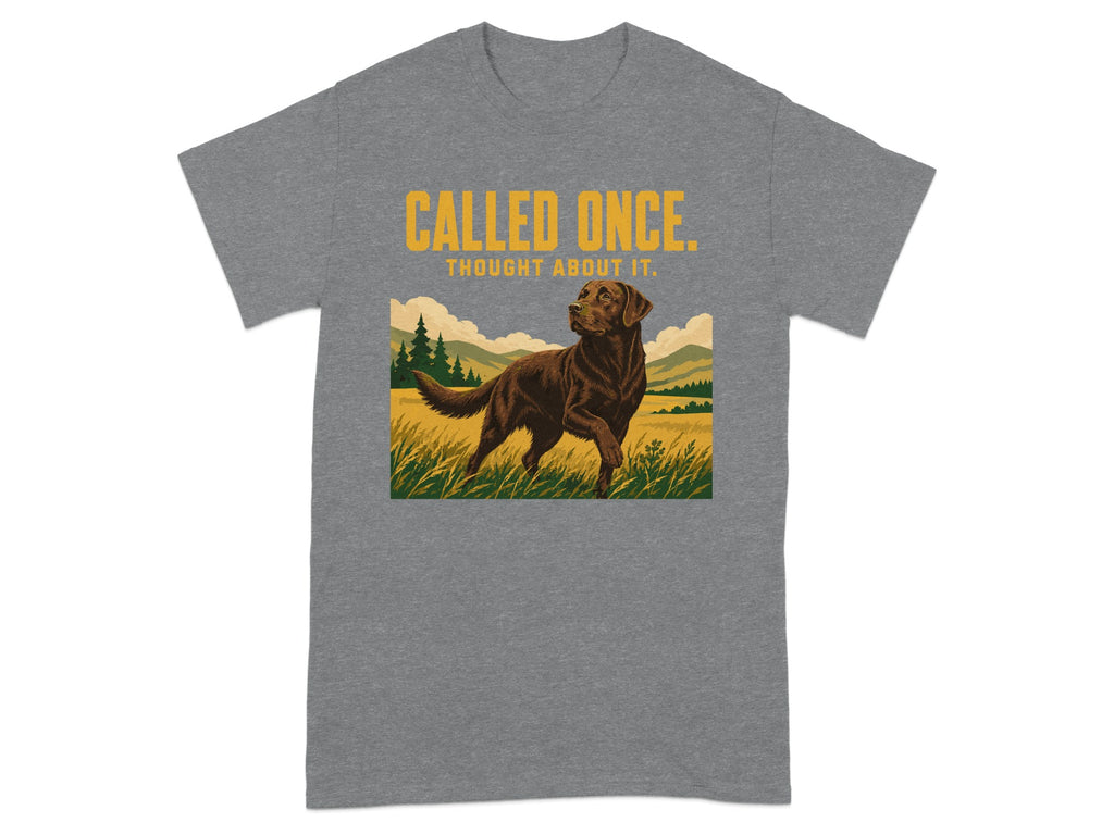 Chocolate lab on a grassy field, with text "CALLED ONCE, THOUGHT ABOUT IT."