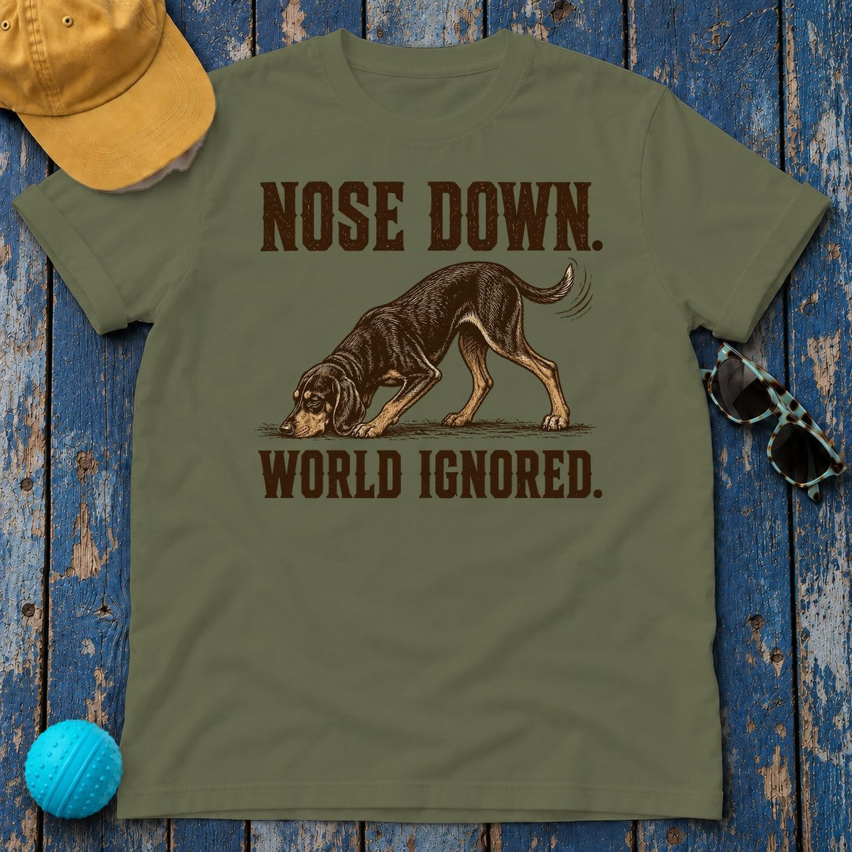 Nose Down. World Ignored. Coonhound T-shirt in Military Green