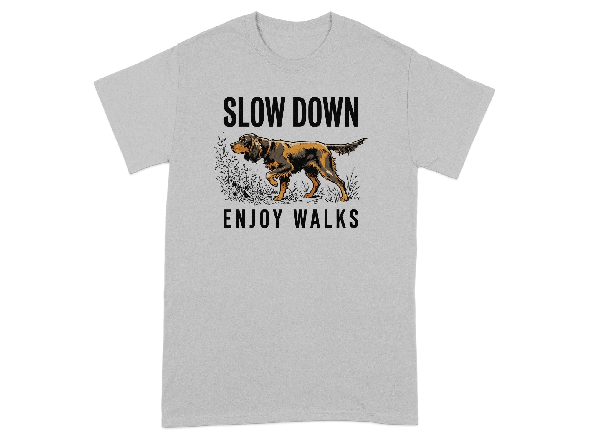Grey t-shirt with graphic of a dog walking among grass and text "SLOW DOWN ENJOY WALKS".