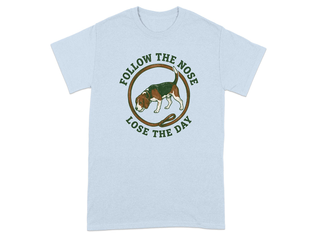Light blue t-shirt with beagle and "Follow the nose, lose the day" text.