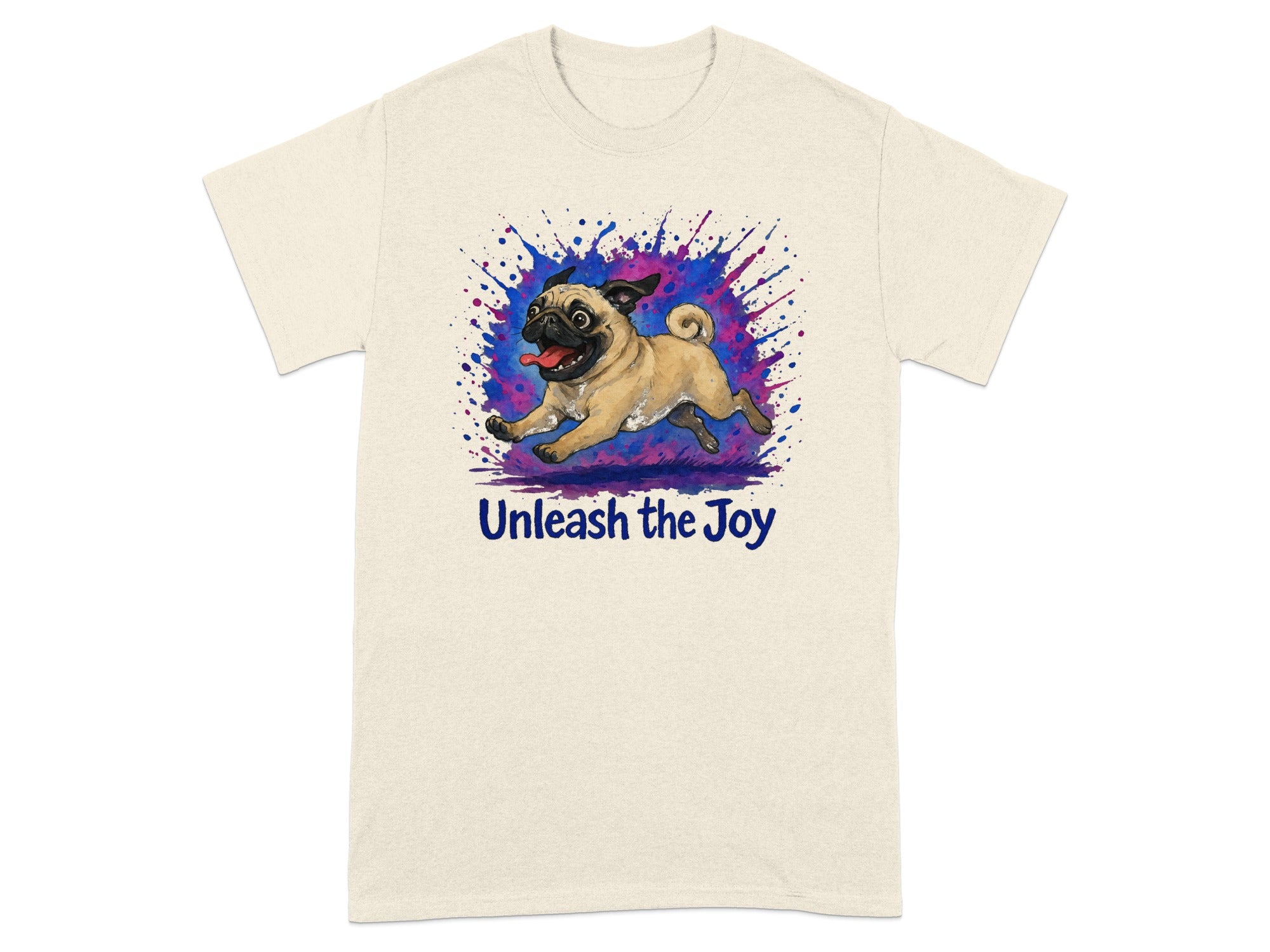Cream t-shirt with a pug running through colorful paint splatters and text "Unleash the Joy".