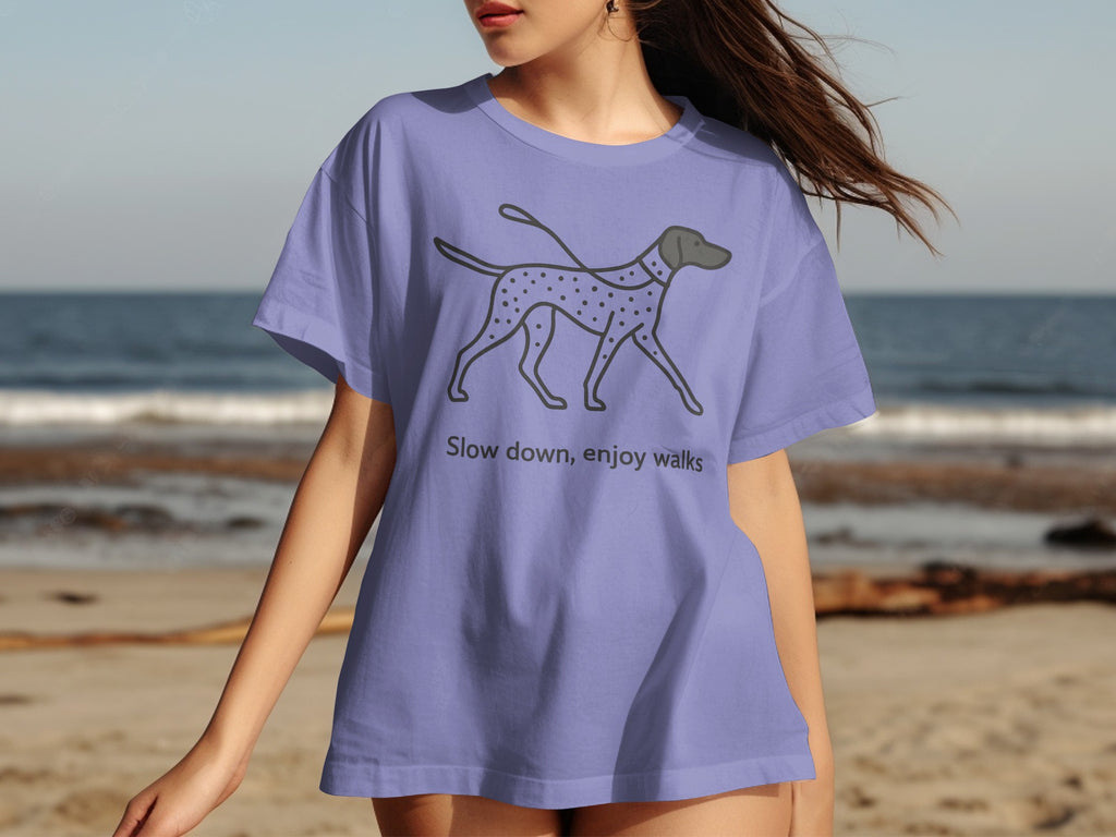 Periwinkle t-shirt with a Dalmatian graphic and text "Slow down, enjoy walks".
