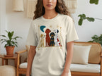 Cream t-shirt with four cartoon dogs of various breeds and colors.