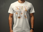 Framed illustrations of corgis, dog toys, and basket on a white t-shirt.