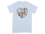 Light blue t-shirt with a heart made of diverse dogs and paw prints, "DOGAHOLIC" text.