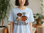 Light blue t-shirt with a German Shorthaired Pointer next to a coffee cup and text.