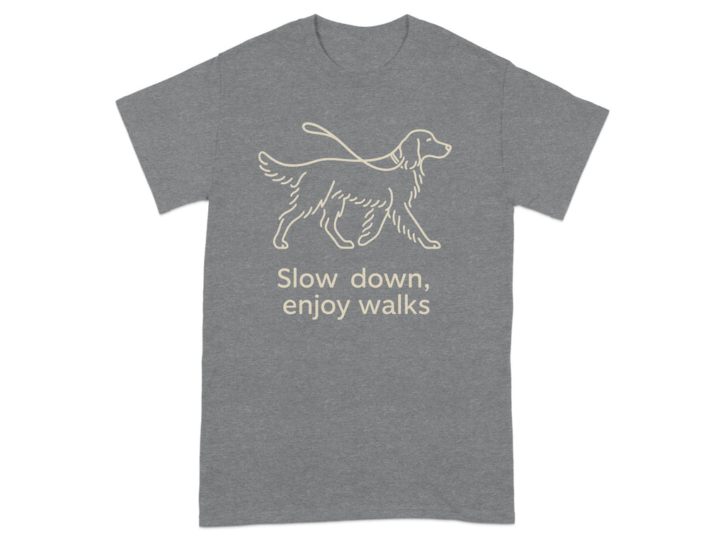 Grey t-shirt with line drawing of a dog on a leash and text "Slow down, enjoy walks."