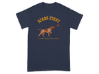 Navy t-shirt with a dog pointing at a bird, text reads "Birds First. Everything Else Later."