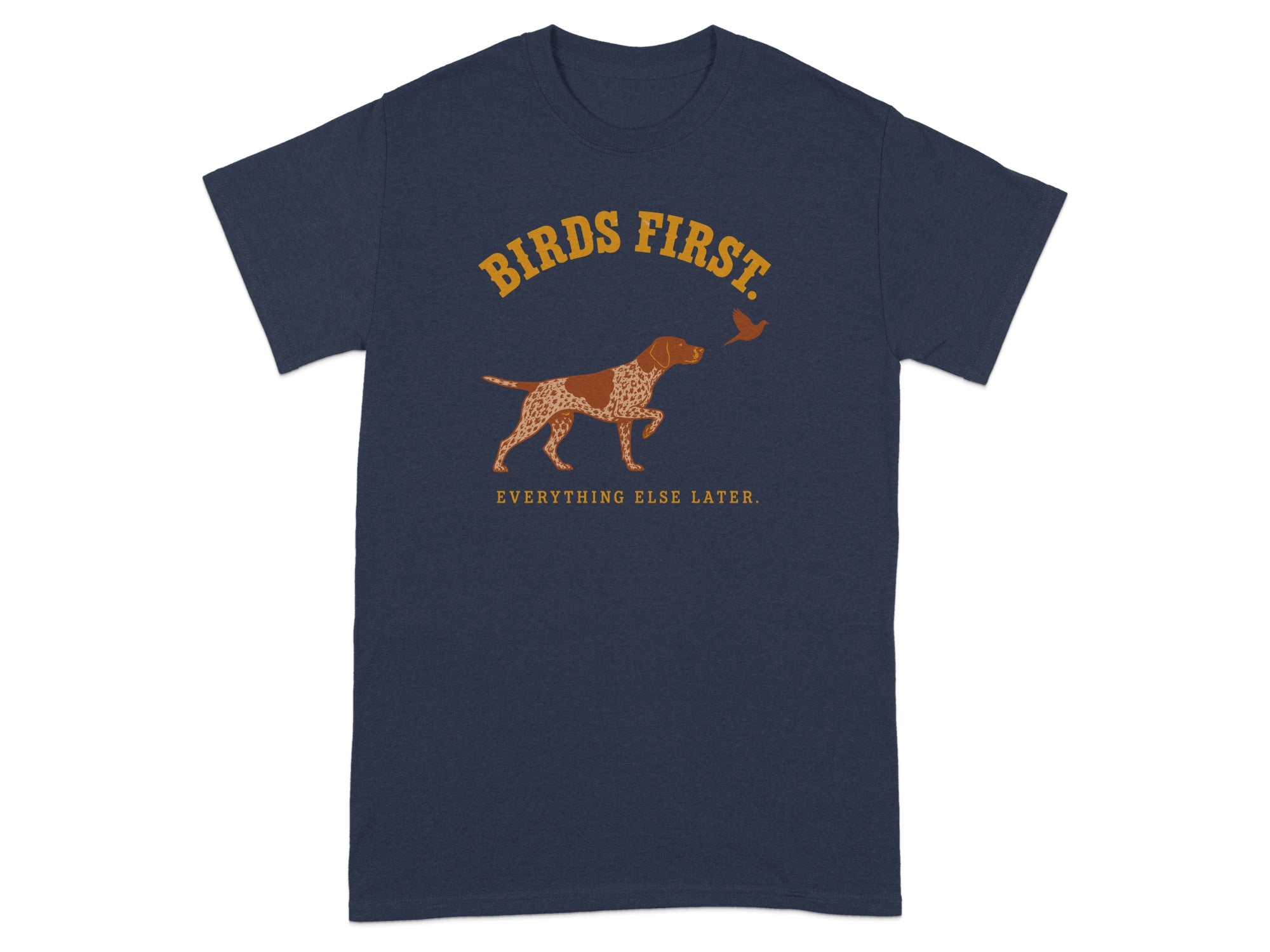 Navy t-shirt with a dog pointing at a bird, text reads "Birds First. Everything Else Later."