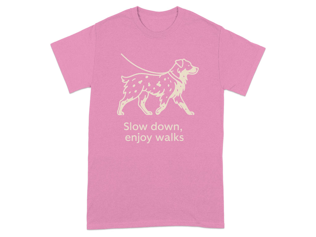 Pink t-shirt with light beige graphic of a dog on a leash and text.