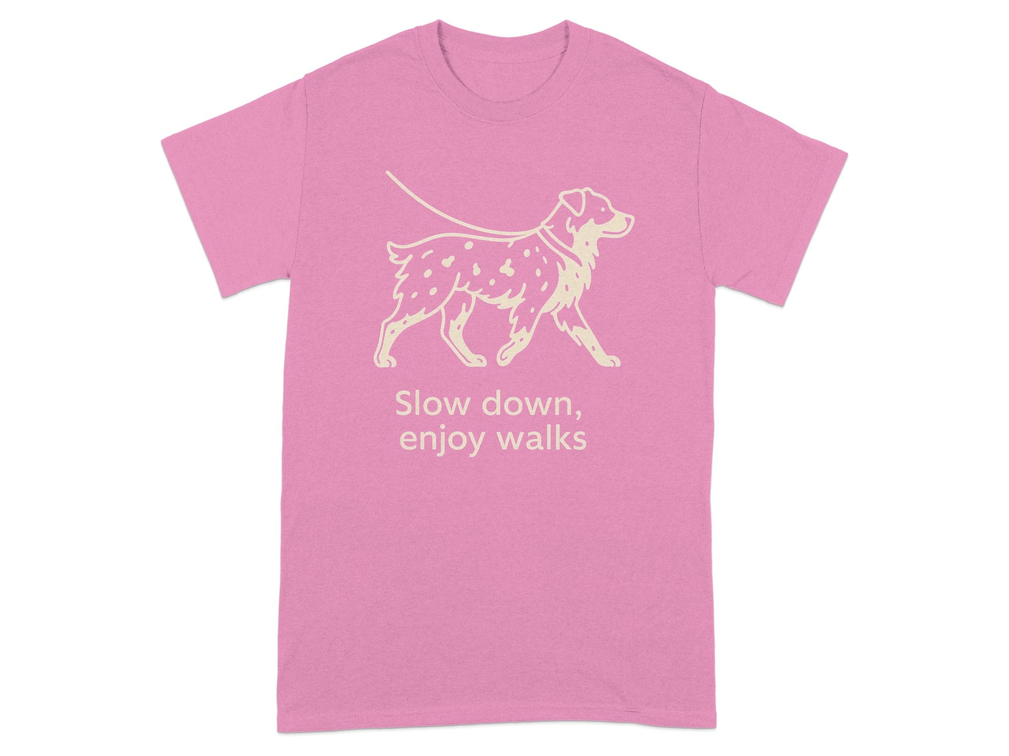 Pink t-shirt with light beige graphic of a dog on a leash and text.
