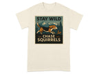 T-shirt with dog chasing squirrel graphic and text "STAY WILD CHASE SQUIRRELS".
