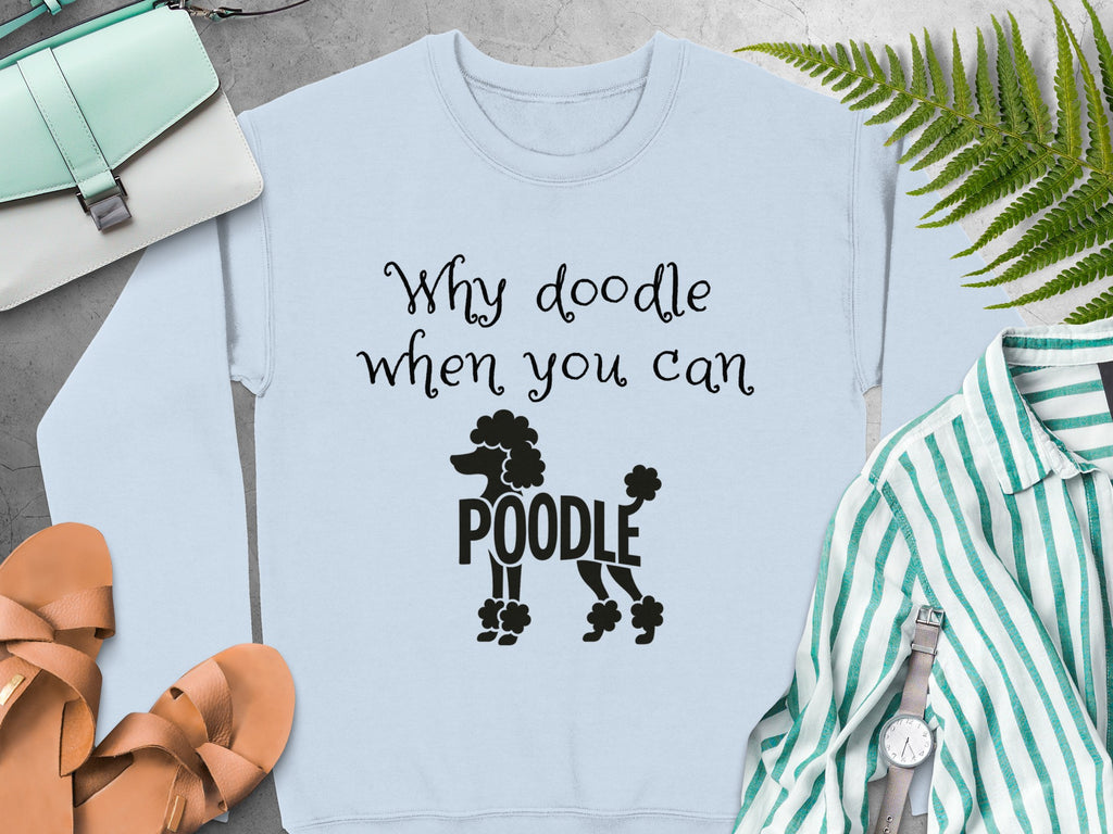 Light blue sweatshirt with "Why doodle when you can POODLE" text and poodle graphic.