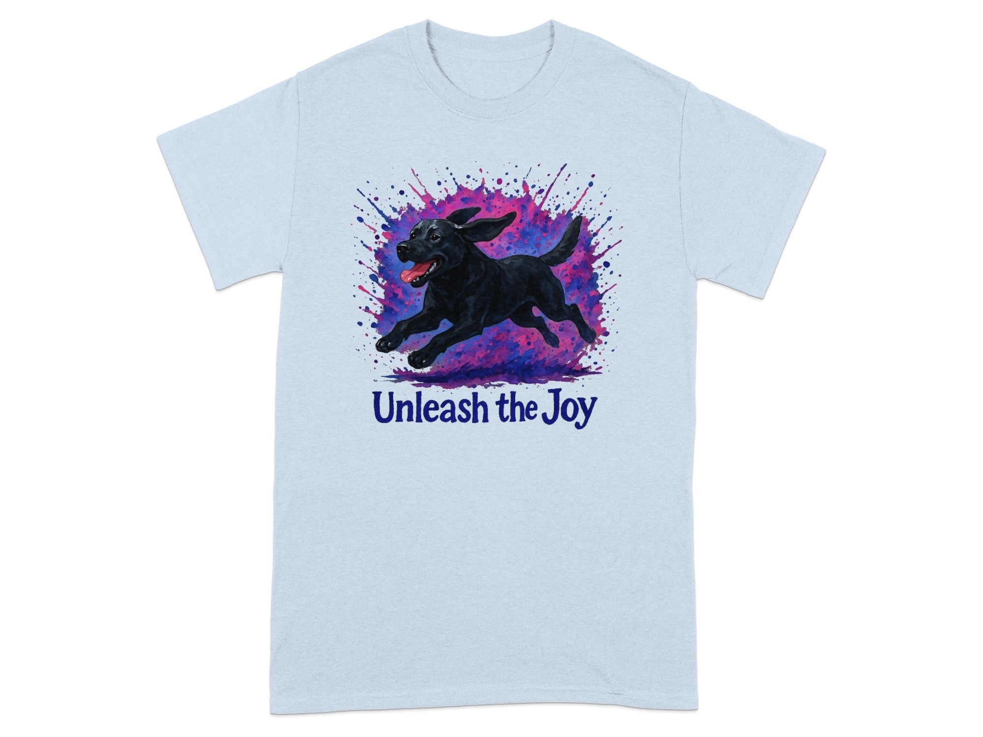 Light blue t-shirt with black dog splattered with pink and purple paint, text "Unleash the Joy"