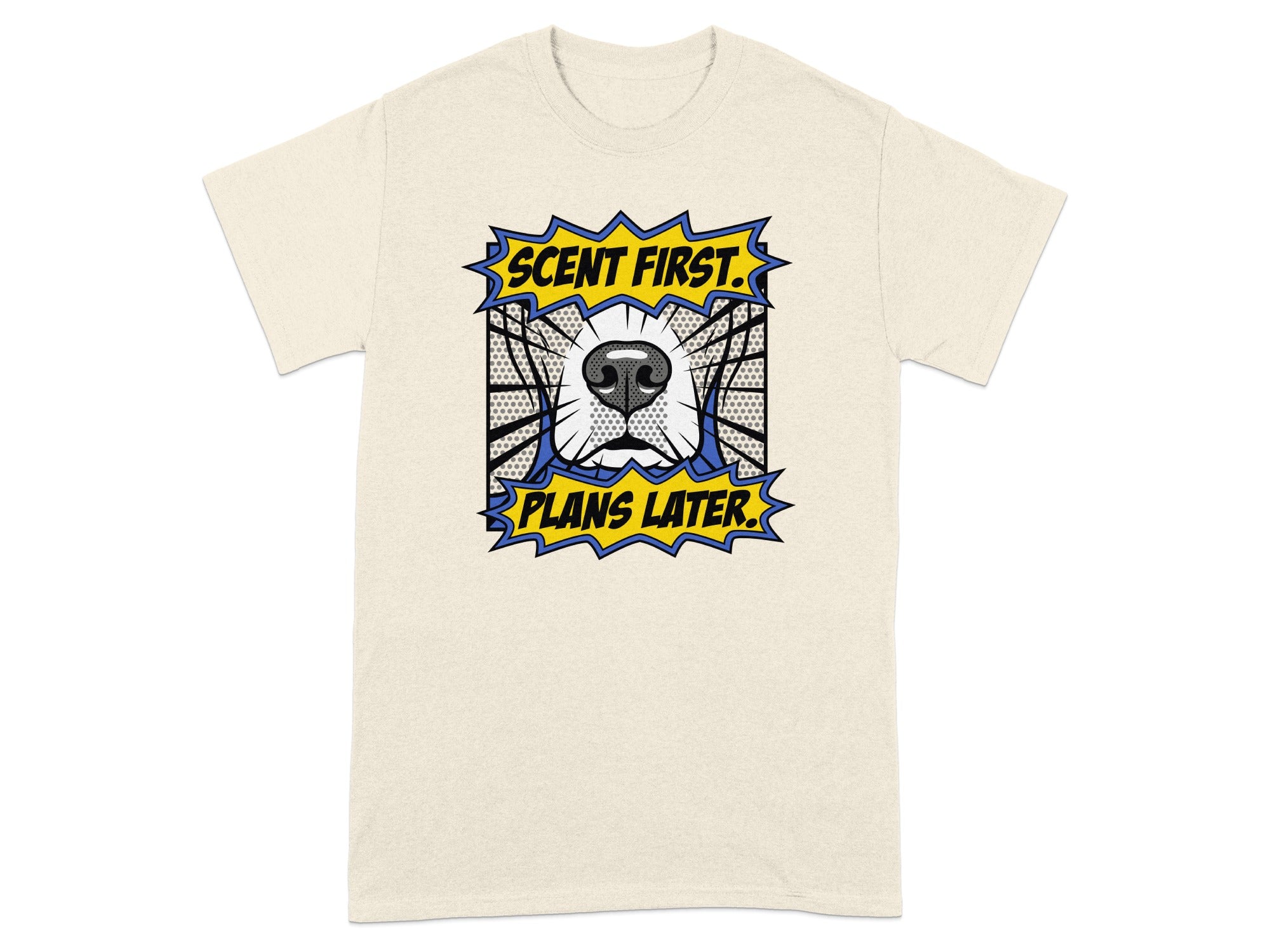 Cream t-shirt with dog nose and "Scent First. Plans Later." comic text.