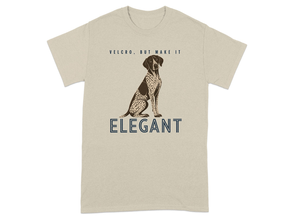Beige t-shirt with a pointer dog and "Velcro, but make it Elegant" text.