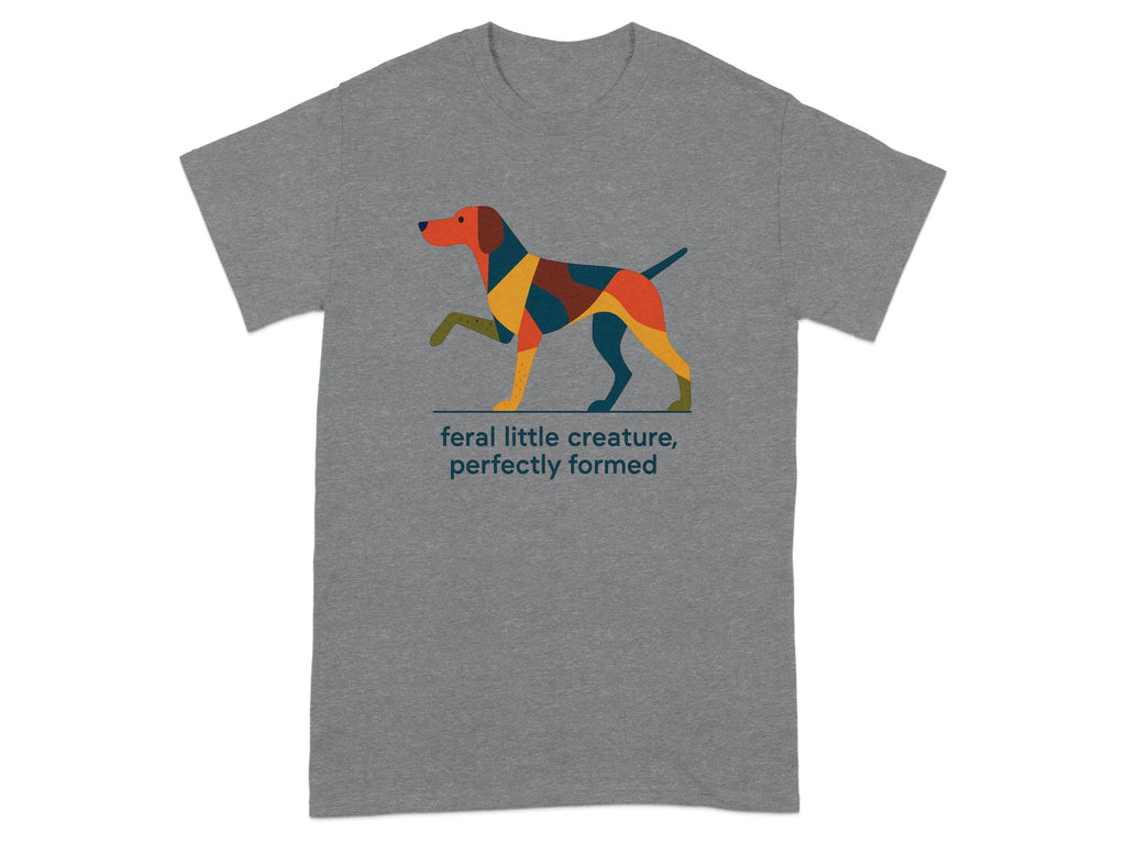 Grey t-shirt with a stylized dog and text "feral little creature, perfectly formed".