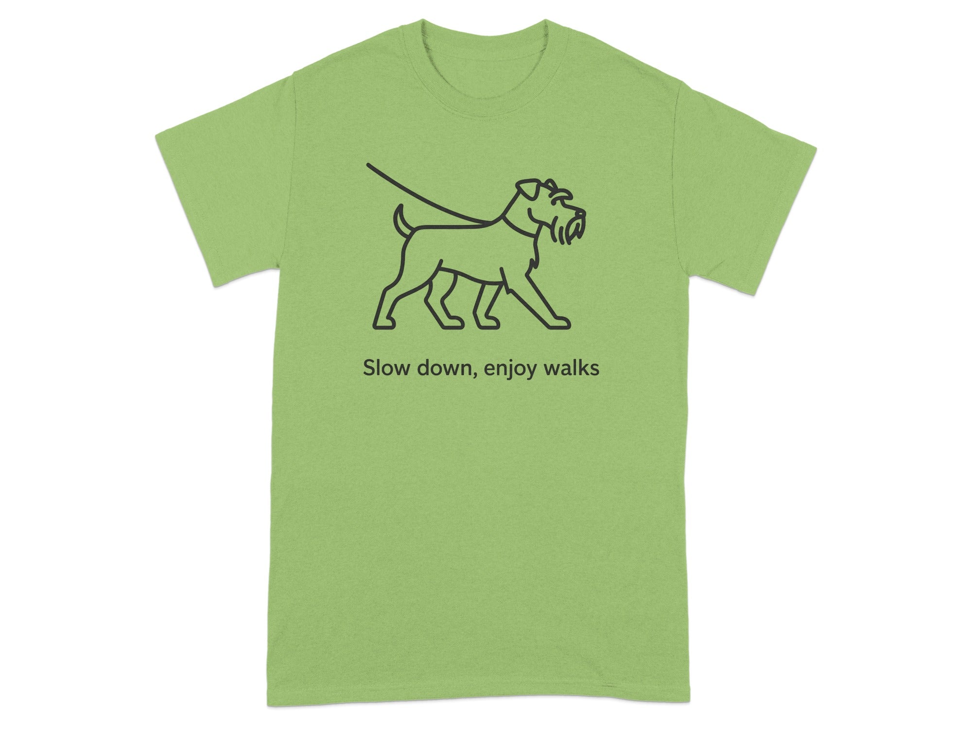 Light green t-shirt with a line drawing of a dog on a leash and the text "Slow down, enjoy walks".