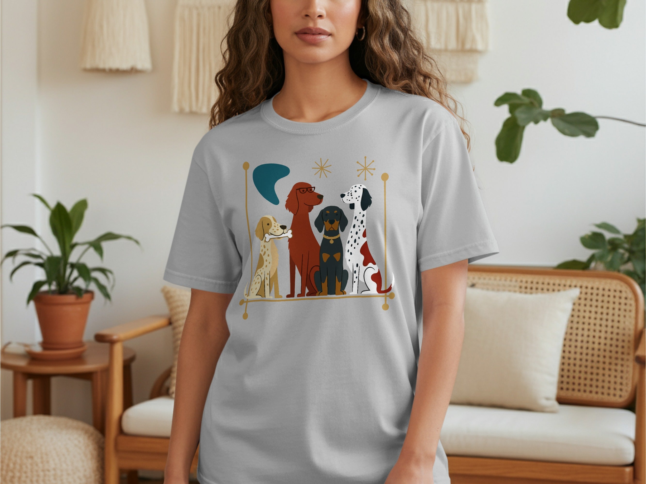 Grey t-shirt with a graphic of four dogs sitting in a line.
