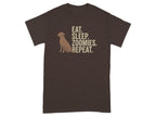 Brown t-shirt with dog silhouette and text "Eat. Sleep. Zoomies. Repeat."