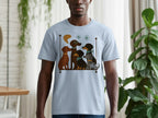 Light blue t-shirt with a graphic featuring four stylized dachshunds sitting on a shelf.