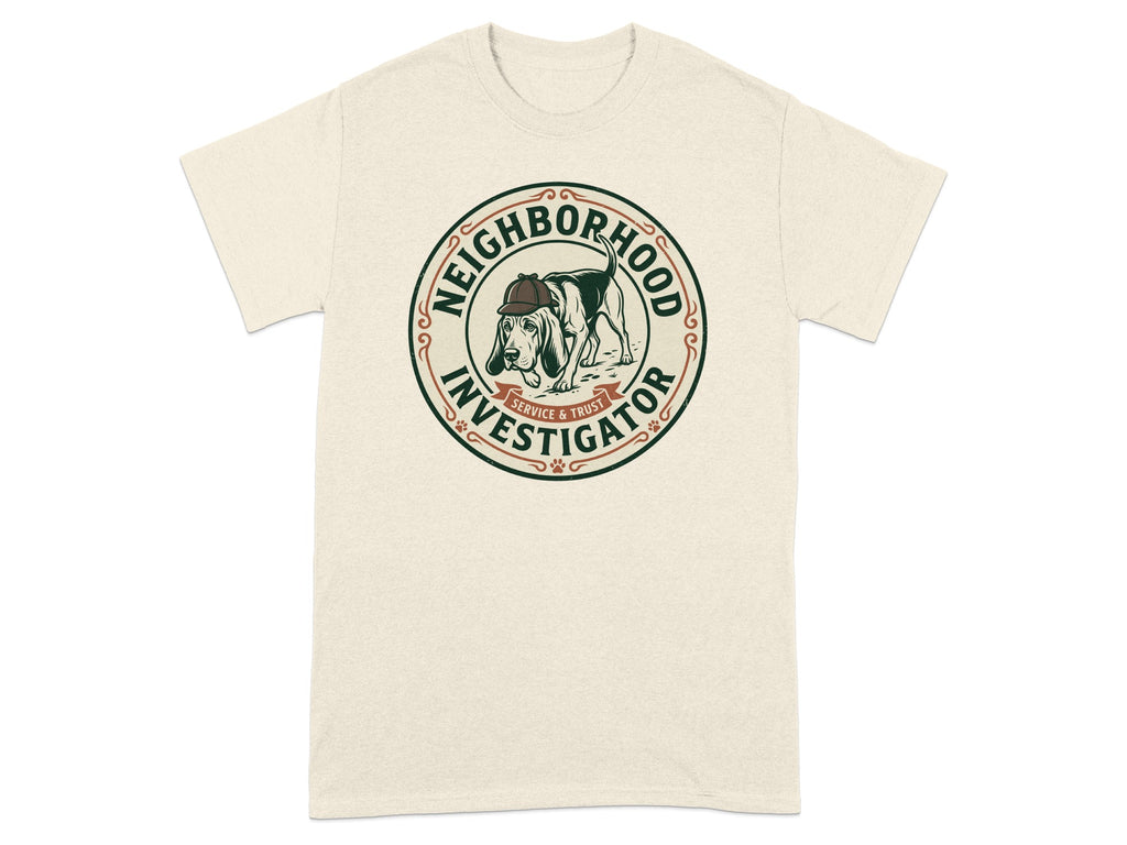 Cream t-shirt with "Neighborhood Investigator" logo featuring a dog detective.