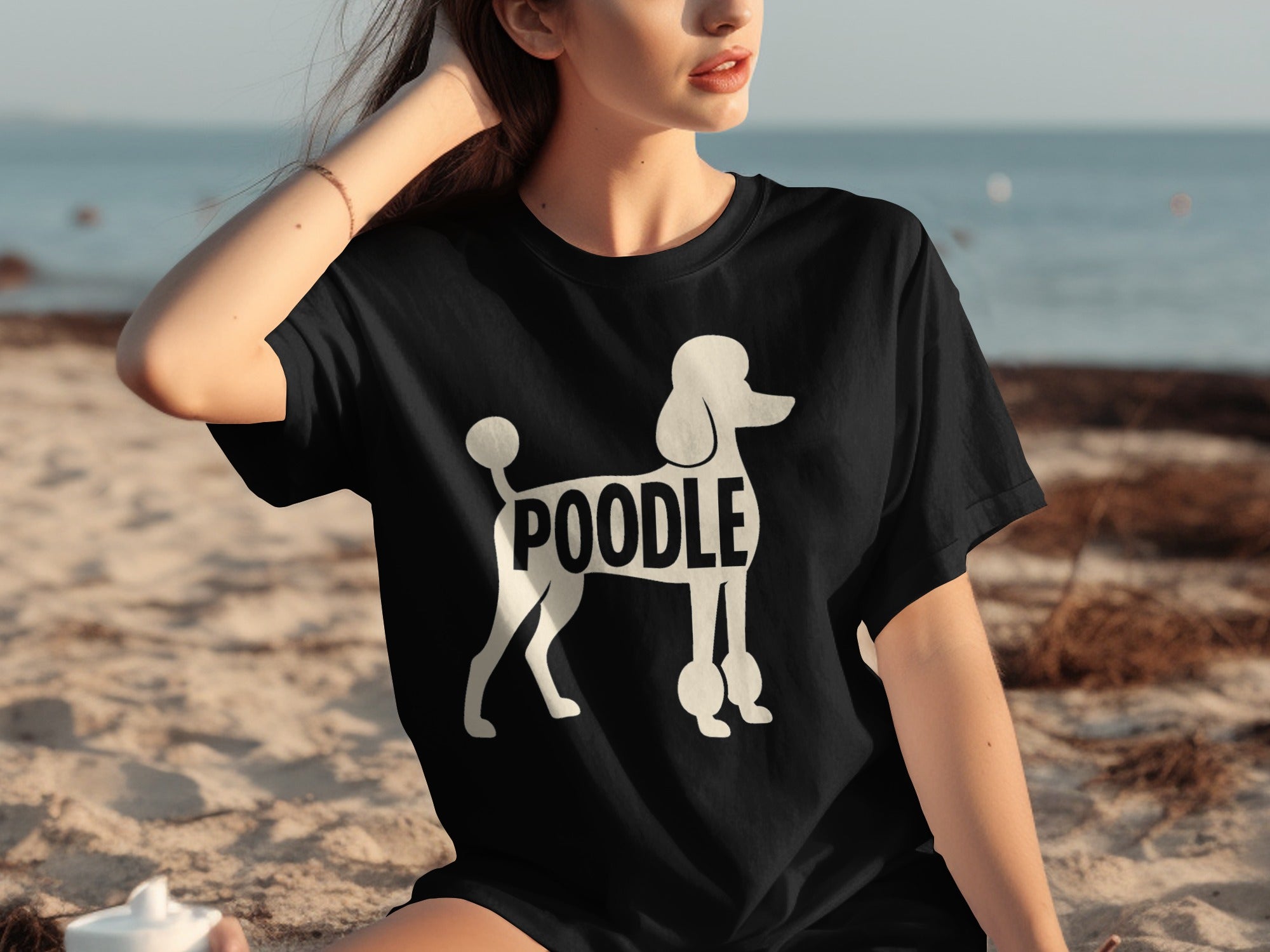 Black t-shirt with white poodle graphic and the word "POODLE".
