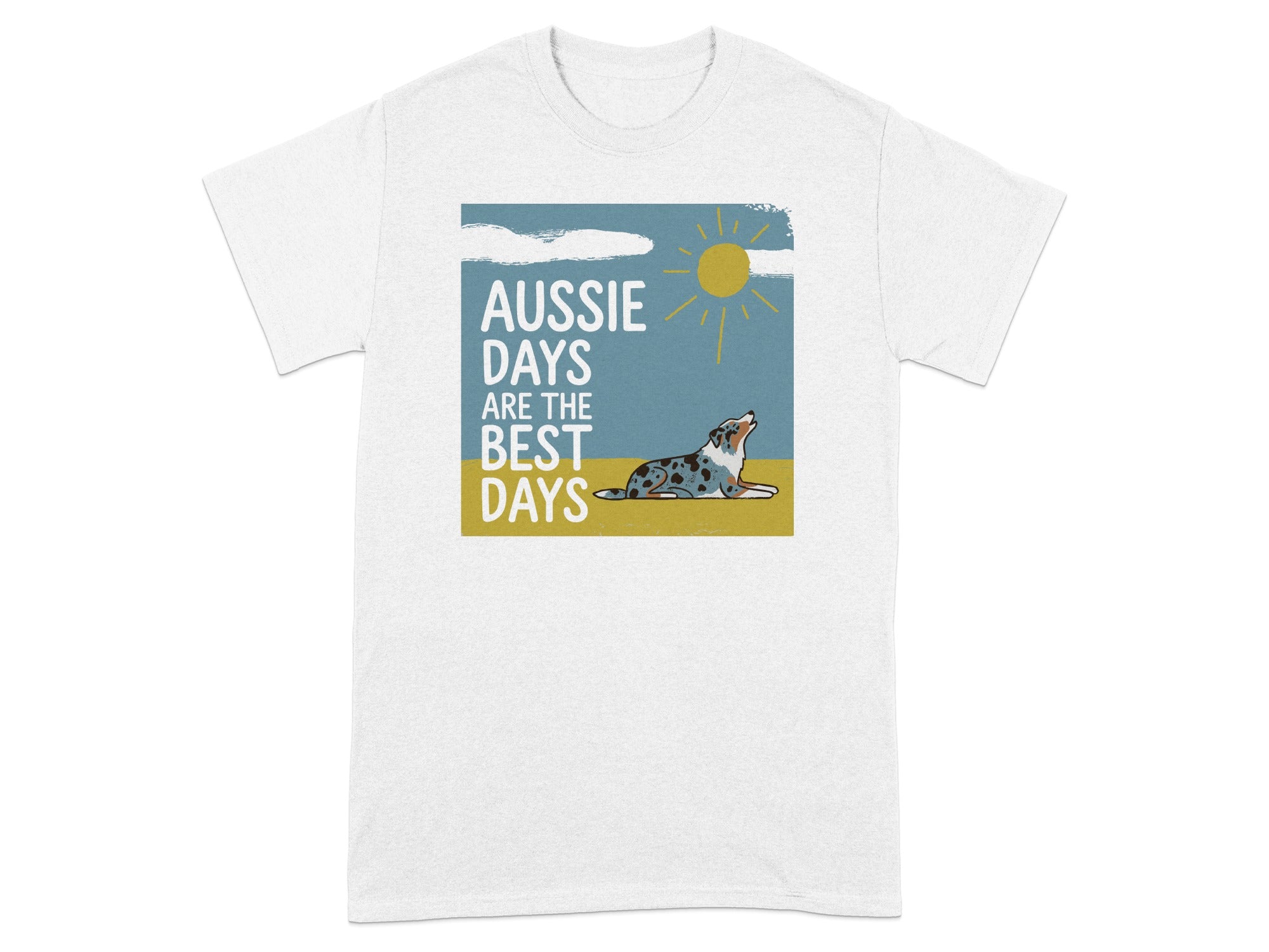 Blue merle Australian Shepherd dog looking up at a sun on a t-shirt.