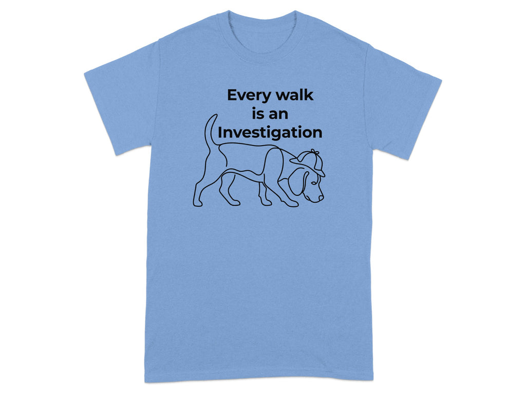 Light blue t-shirt with black line drawing of a dog and "Every walk is an Investigation" text.