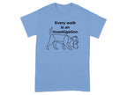 Light blue t-shirt with black line drawing of a dog and "Every walk is an Investigation" text.