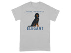 Grey t-shirt with a black dog and the text "VELCRO, BUT MAKE IT ELEGANT".