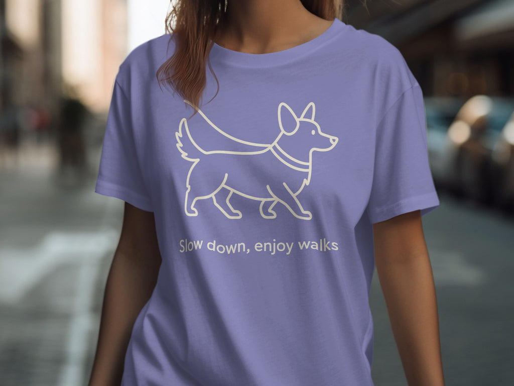 Light line drawing of a dog with text "Slow down, enjoy walks".