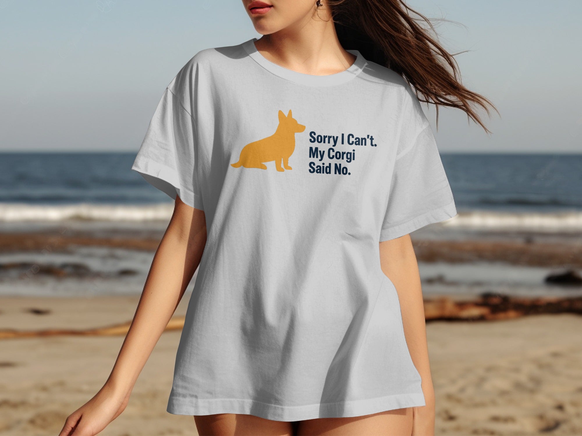 White t-shirt with orange corgi silhouette and text "Sorry I Can't. My Corgi Said No."