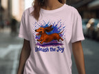 Brown dachshund running with colorful ink splatters and text "Unleash the Joy".