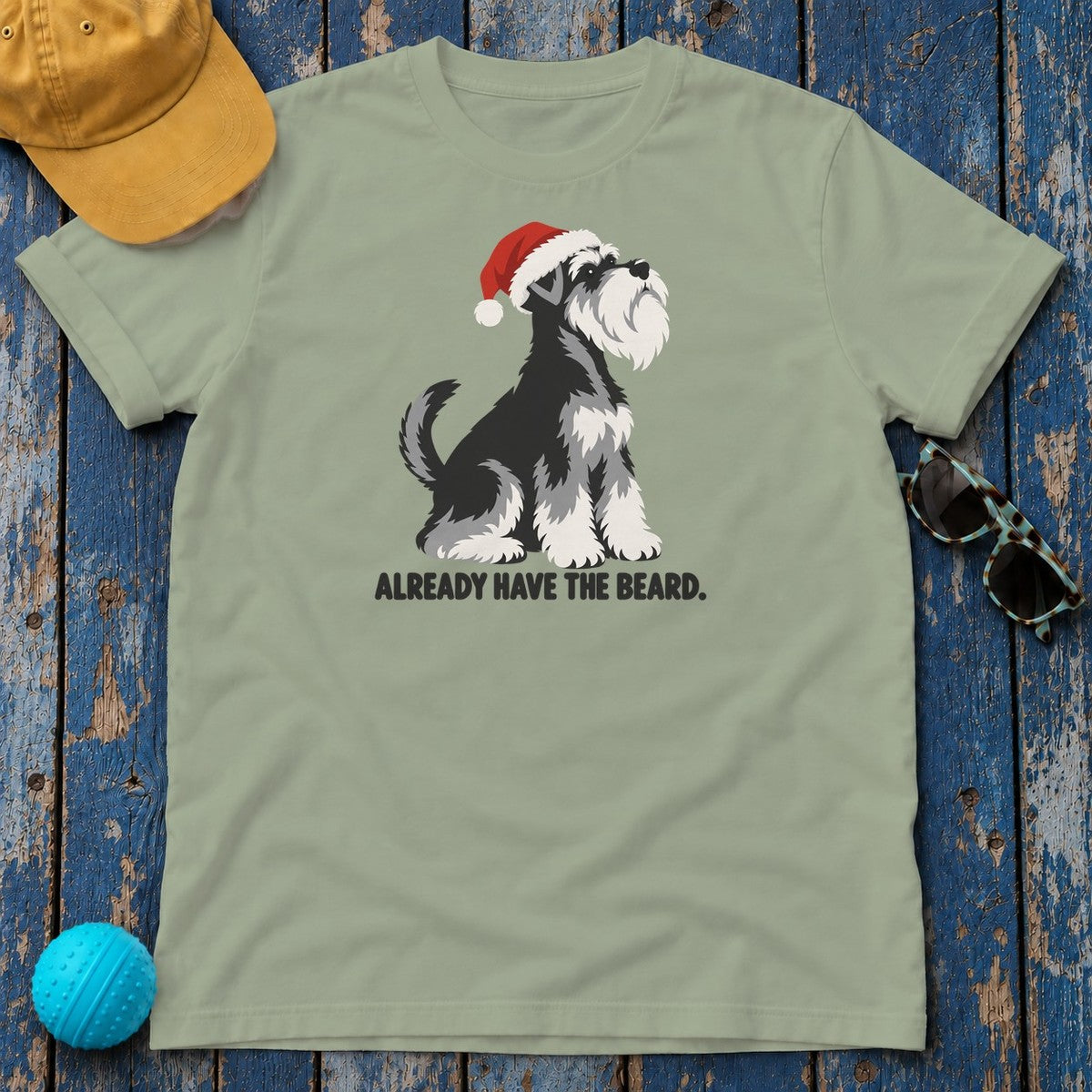 Already Have the Beard Sitting Santa Schnauzer T-Shirt in Sage - flat lay