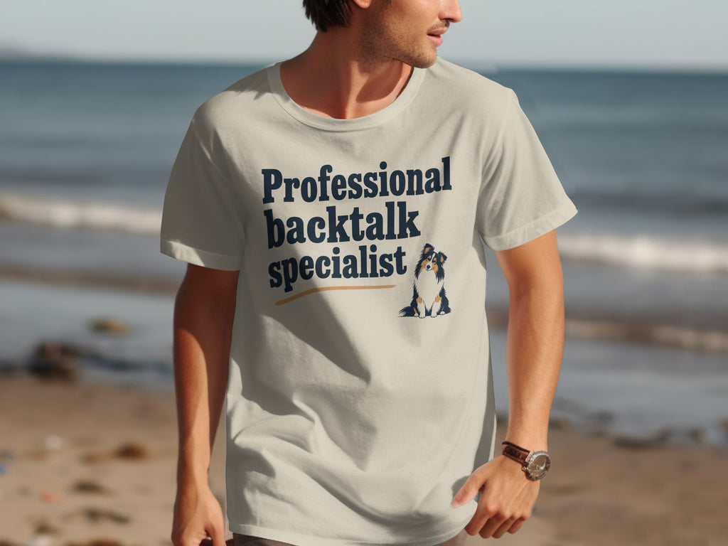Man wearing t-shirt with text "Professional backtalk specialist" and small dog graphic.