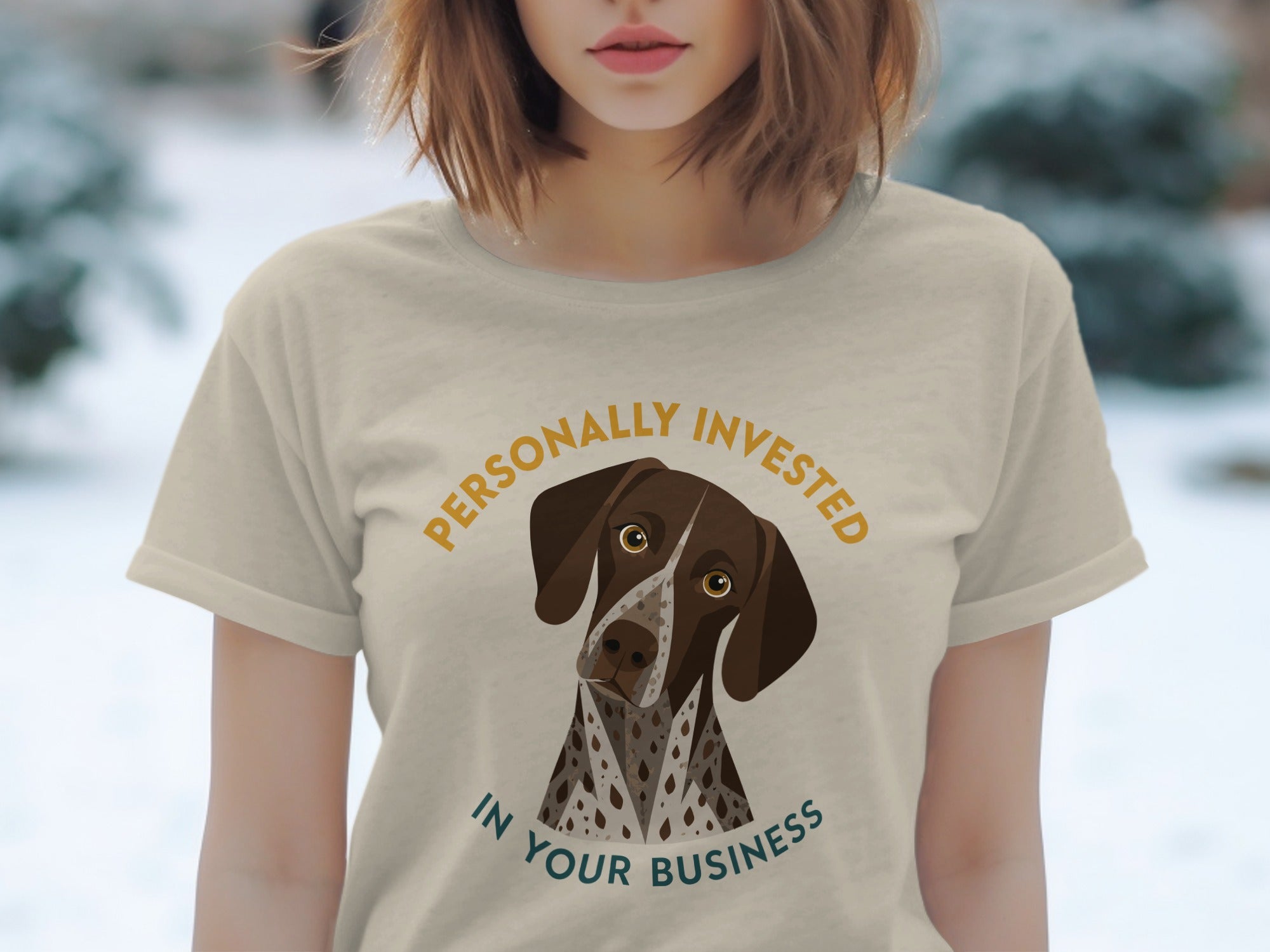 German Shorthaired Pointer on a beige t-shirt with text "Personally Invested in Your Business".