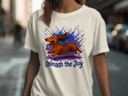 White t-shirt with leaping dachshund and blue purple watercolor splash. Unleash the Joy.