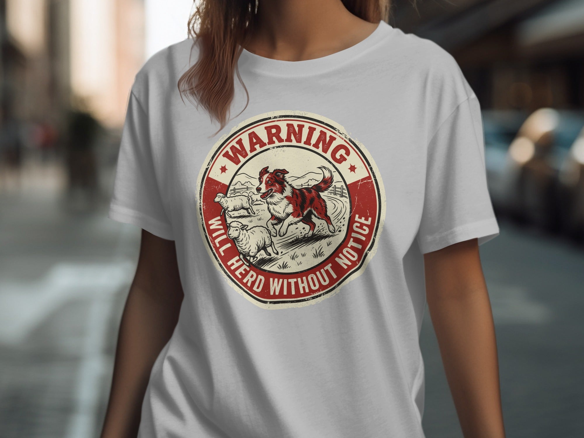 Circular "Warning" logo with dog herding sheep.